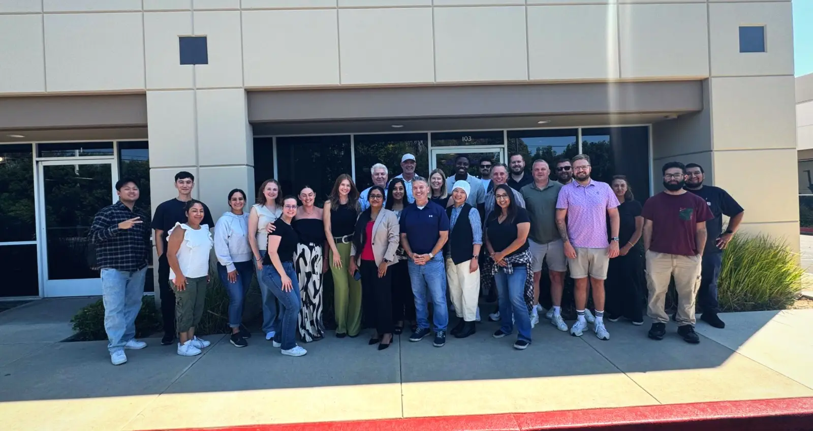 The NexGen Digital UK team and the Irvine staff outside NexGen Digital headquarters in Irvine, California, September 2026.