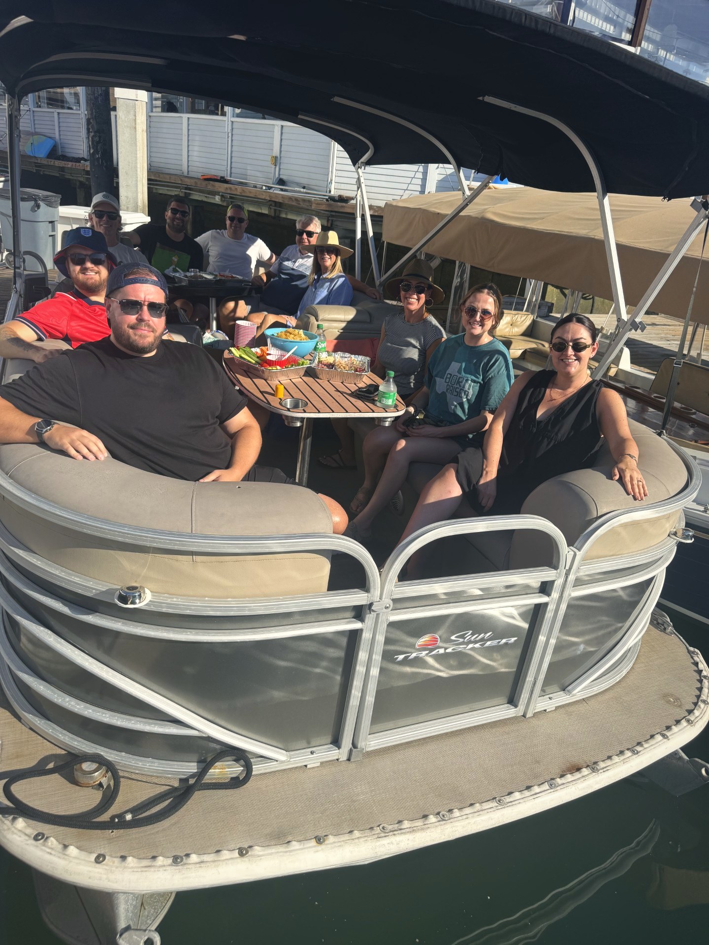 The NexGen Digital UK team and Irvine colleagues on a pontoon boat in Newport Beach during the UK team visit.